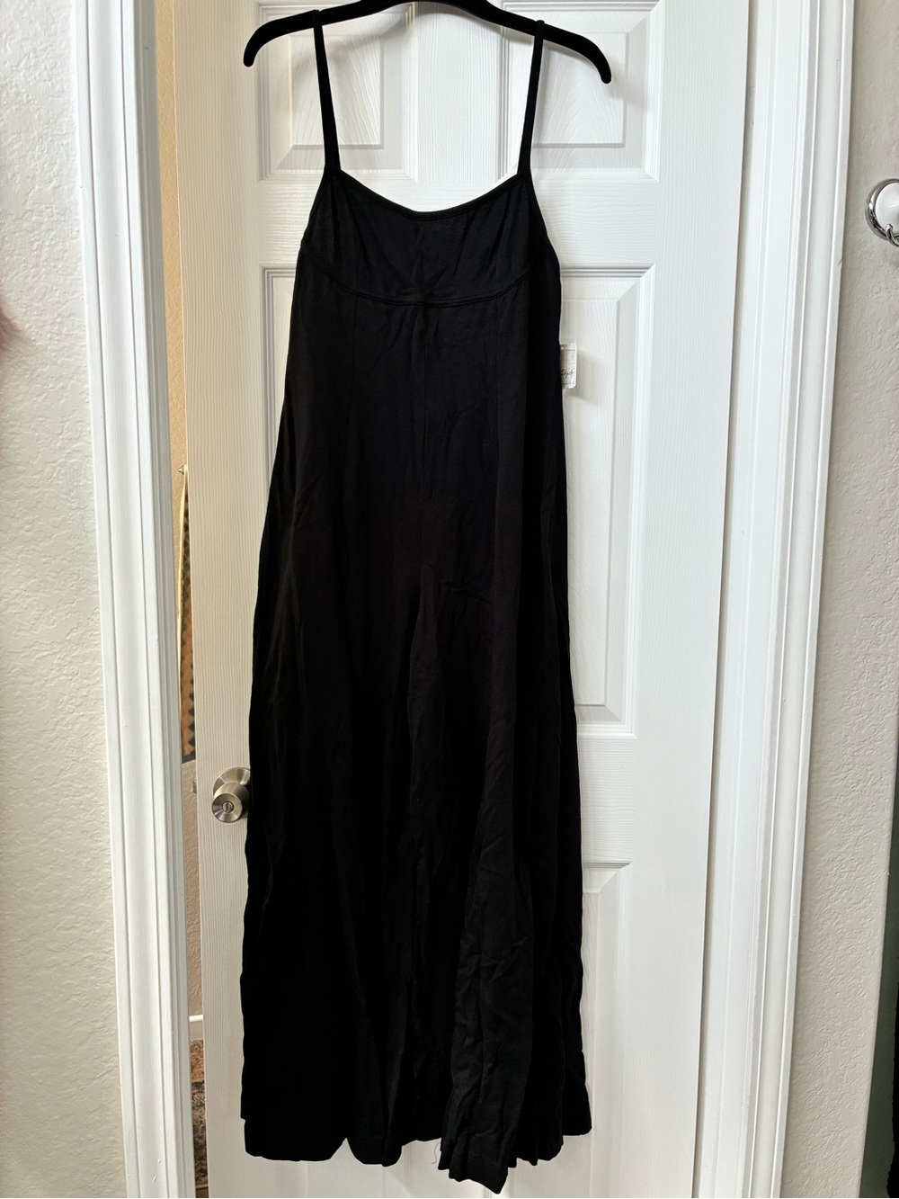 Free People “Morey” Black Boot Cut Jumpsuit